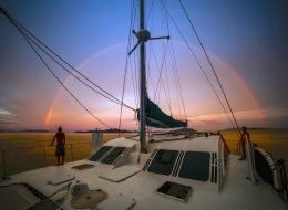 Catamaran Mahayana under the rainbox
